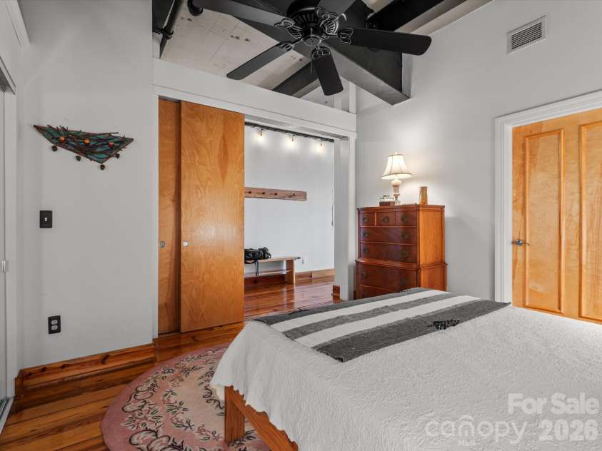 100 Coxe Avenue, Asheville, NC 28801.  MLS# CAR4307768, YatesRealty ID 4570. Mirrored, closet storage for organization