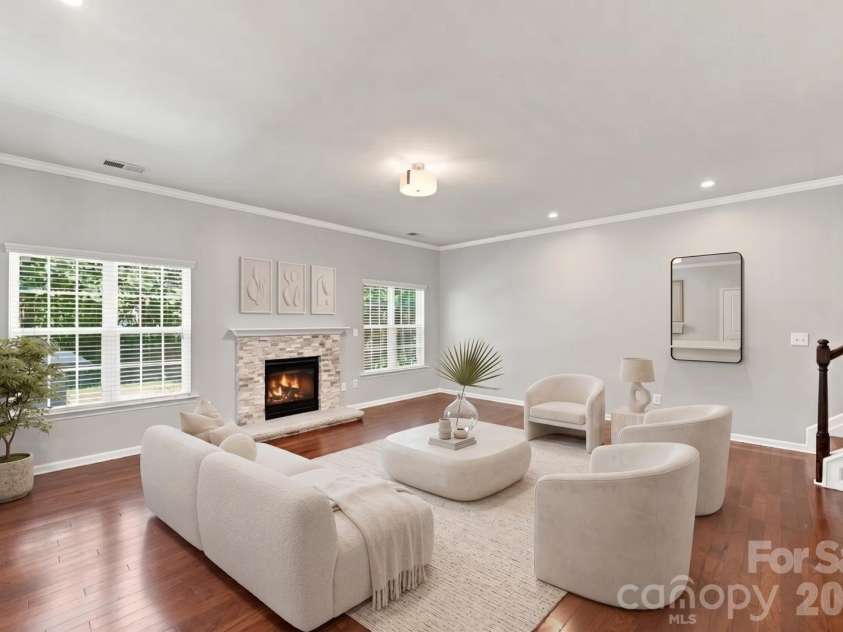 4852 Pepper Drive, Harrisburg, NC 28075.  MLS# CAR4412976, YatesRealty ID 45702. Family Room - Virtually Staged