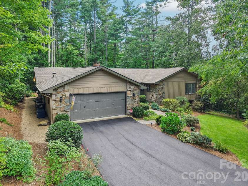 133 Larchmont Drive, Hendersonville, NC 28791.  MLS# CAR4415855, YatesRealty ID 45708. Drone view of front