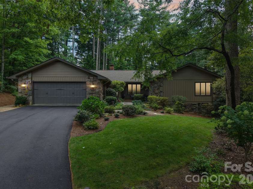 133 Larchmont Drive, Hendersonville, NC 28791.  MLS# CAR4415855, YatesRealty ID 45708. Front at night