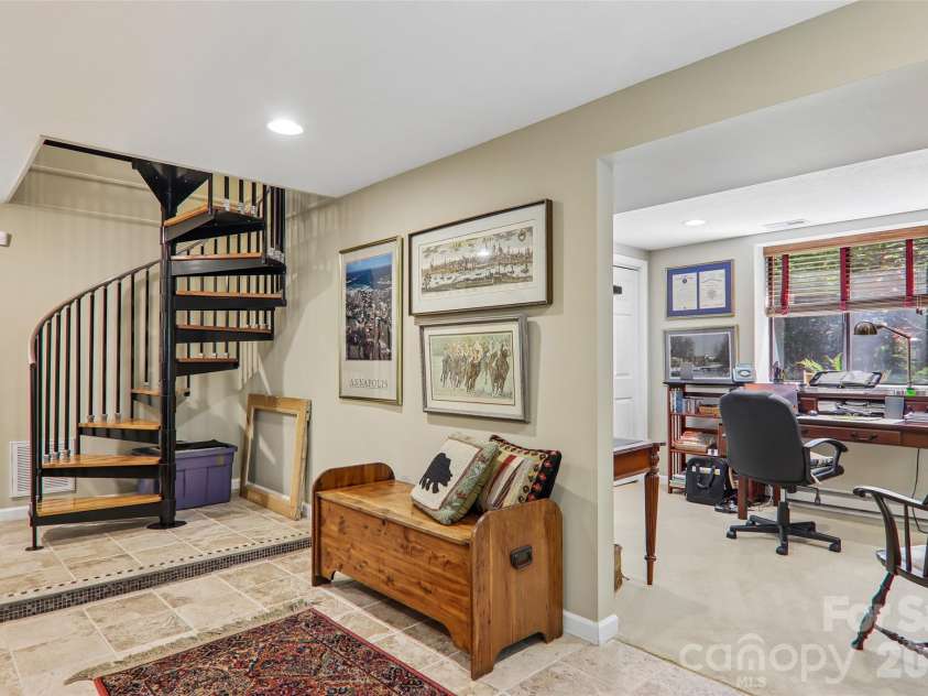 133 Larchmont Drive, Hendersonville, NC 28791.  MLS# CAR4415855, YatesRealty ID 45708. Lower level office space