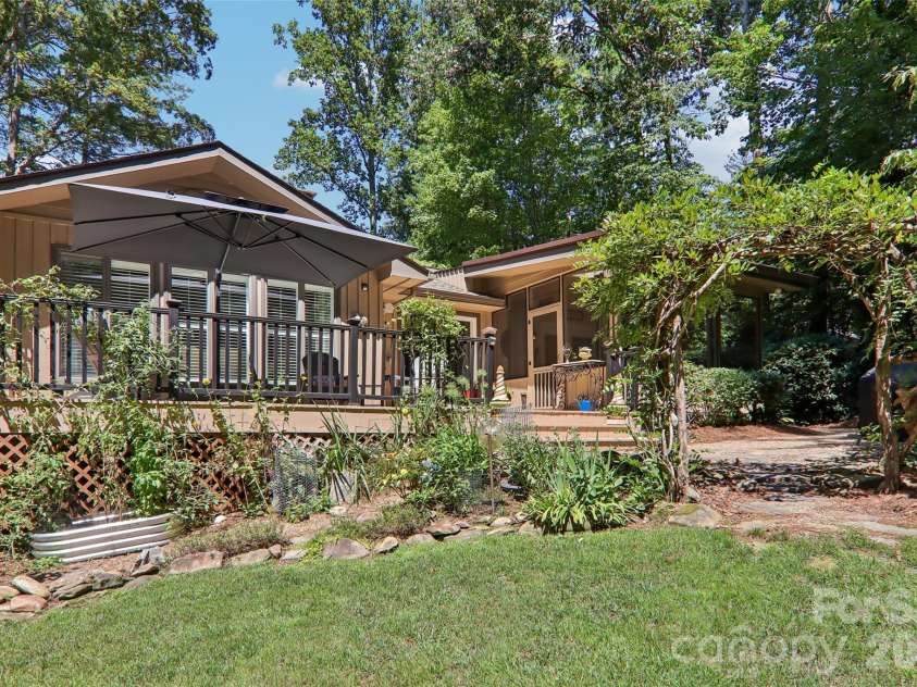 133 Larchmont Drive, Hendersonville, NC 28791.  MLS# CAR4415855, YatesRealty ID 45708. Rear view of home