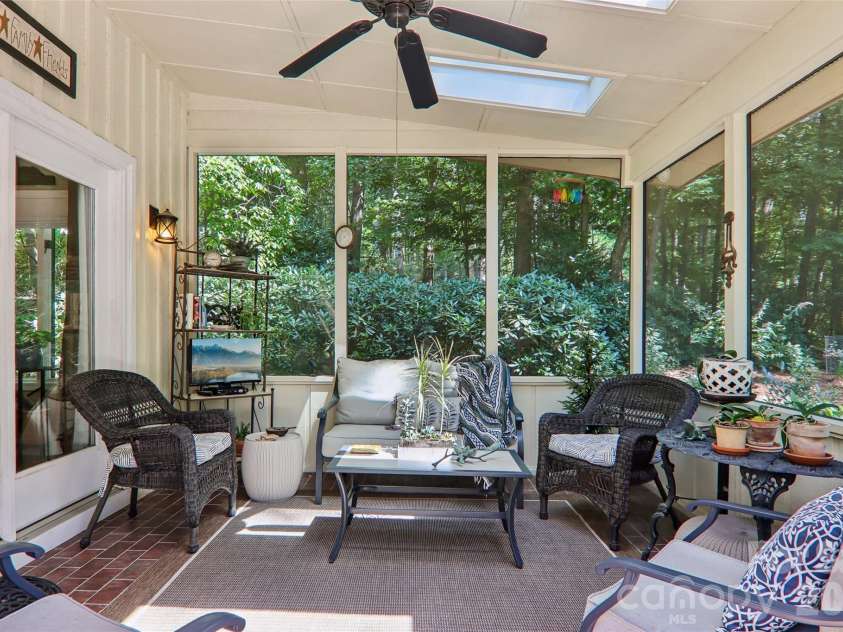 133 Larchmont Drive, Hendersonville, NC 28791.  MLS# CAR4415855, YatesRealty ID 45708. Screened porch off main level