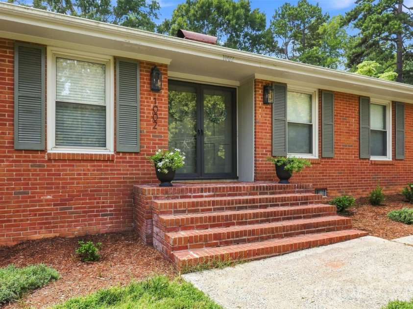 1002 Leewood Drive, Monroe, NC 28112.  MLS# CAR4416687, YatesRealty ID 45719. Charming entry into this all brick home!