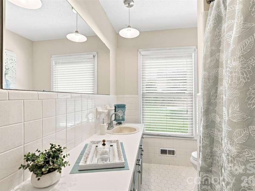 1002 Leewood Drive, Monroe, NC 28112.  MLS# CAR4416687, YatesRealty ID 45719. Common bath off the hallway