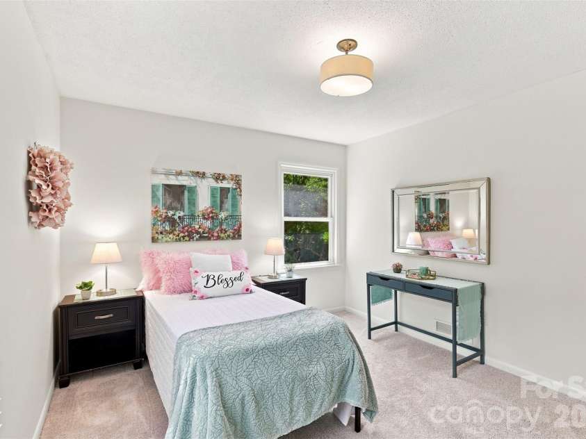 1002 Leewood Drive, Monroe, NC 28112.  MLS# CAR4416687, YatesRealty ID 45719. Secondary bedrooms are flooded with natural light