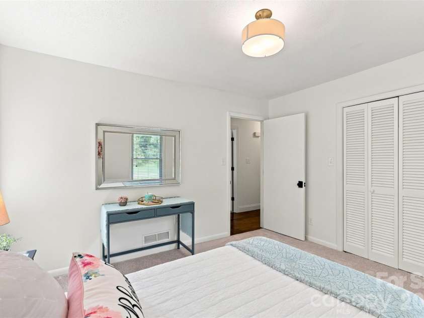 1002 Leewood Drive, Monroe, NC 28112.  MLS# CAR4416687, YatesRealty ID 45719. Updated lighting and new carpet in bedrooms