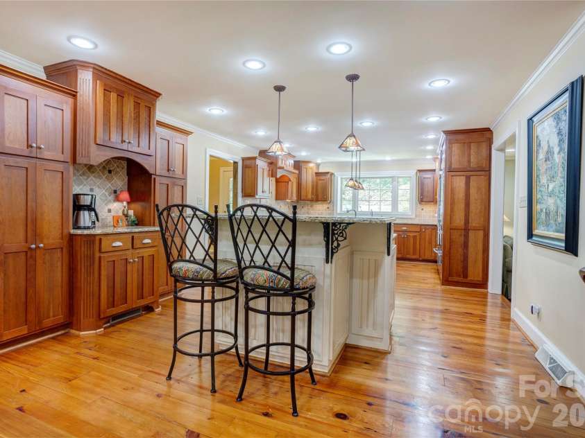 129 Overbrook Drive, Concord, NC 28025.  MLS# CAR4416139, YatesRealty ID 45731. Island seating