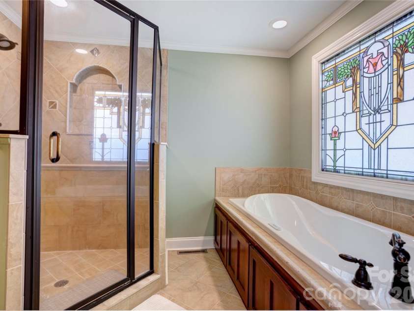 129 Overbrook Drive, Concord, NC 28025.  MLS# CAR4416139, YatesRealty ID 45731. Primary bathroom