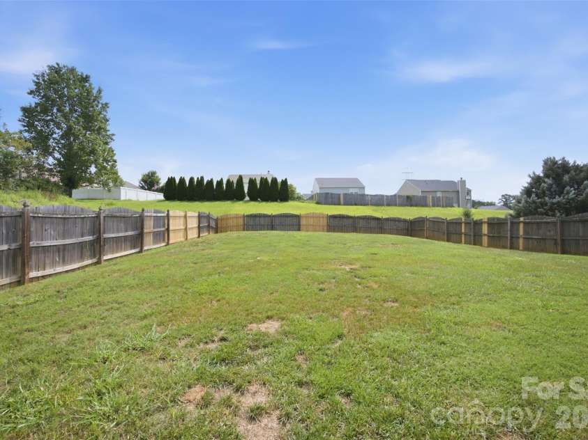 1106 Rainier Lane, Gastonia, NC 28052.  MLS# CAR4416403, YatesRealty ID 45738. Fully fenced yard