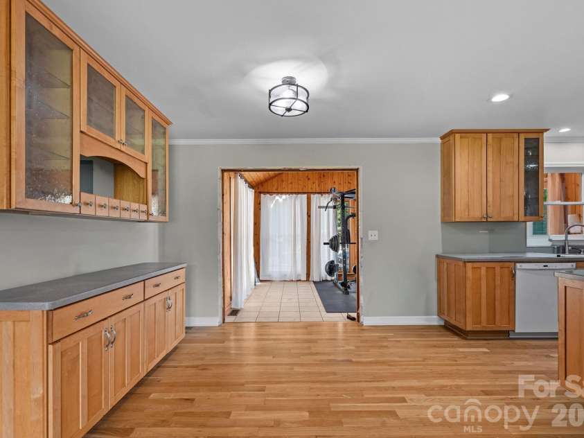 1295 Parris Road, Rock Hill, SC 29732.  MLS# CAR4411338, YatesRealty ID 45739. Dining area leading into sunroom
