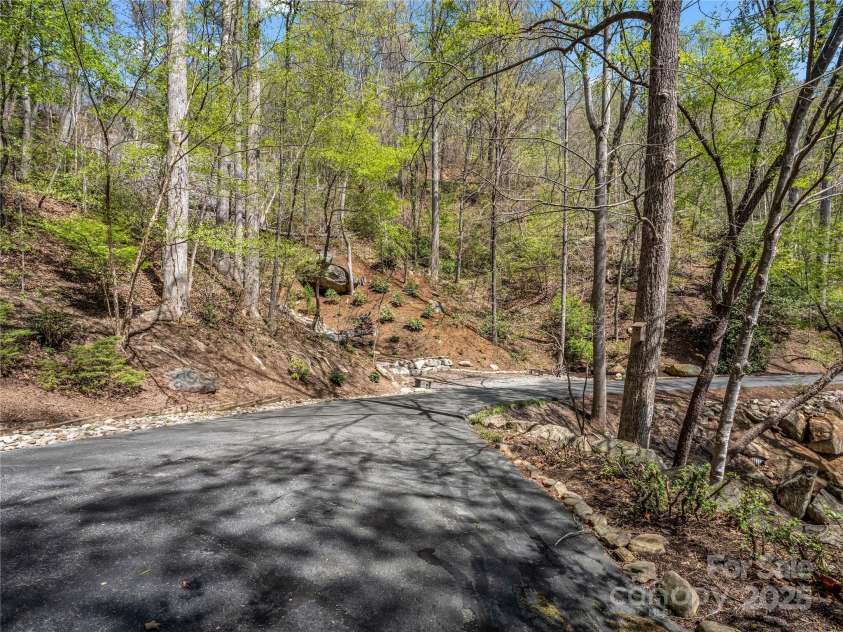 128 Moffitt Road, Lake Lure, NC 28746.  MLS# CAR4243932, YatesRealty ID 4574. 