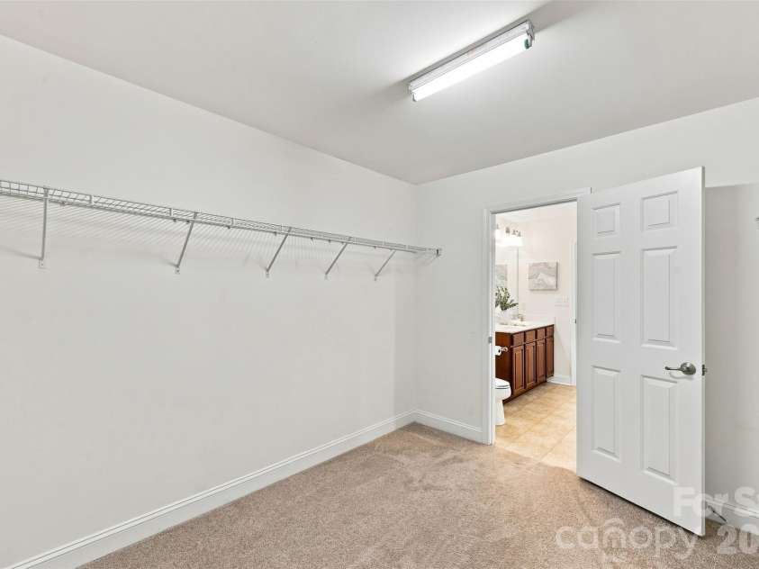 15614 Normans Landing Drive, Charlotte, NC 28273.  MLS# CAR4416333, YatesRealty ID 45741. Massive Walk-in closet.