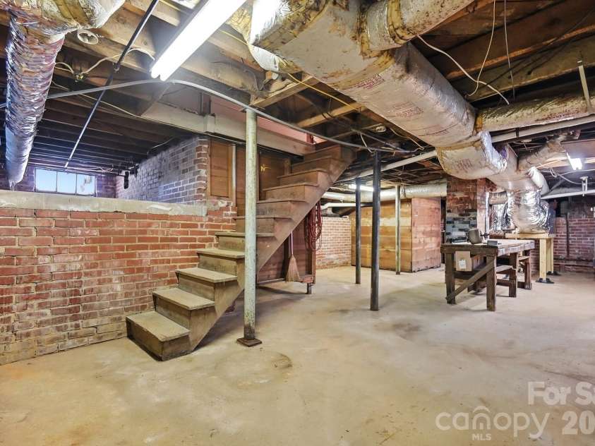 302 Ridge Avenue, Kannapolis, NC 28083.  MLS# CAR4414149, YatesRealty ID 45746. Large unfinished basement