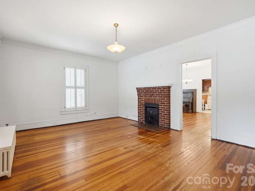 302 Ridge Avenue, Kannapolis, NC 28083.  MLS# CAR4414149, YatesRealty ID 45746. Living Room with fireplace