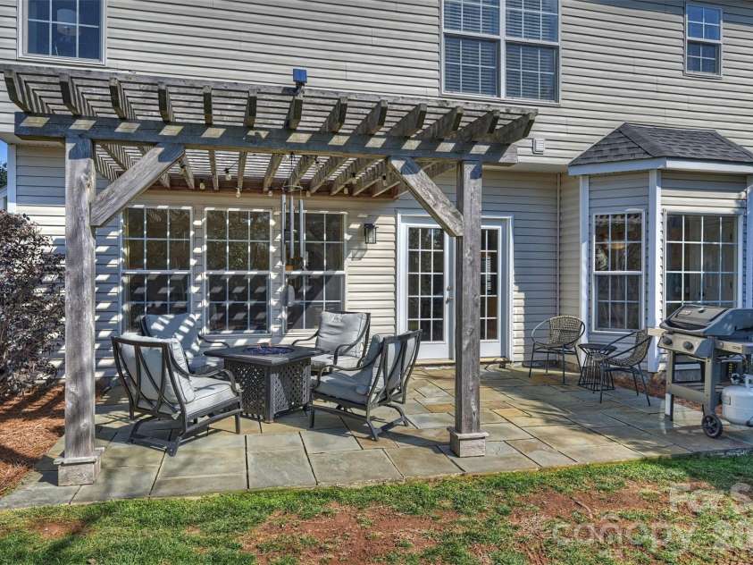 9528 Autumn Applause Drive, Charlotte, NC 28277.  MLS# CAR4340499, YatesRealty ID 4577. Refined outdoor living