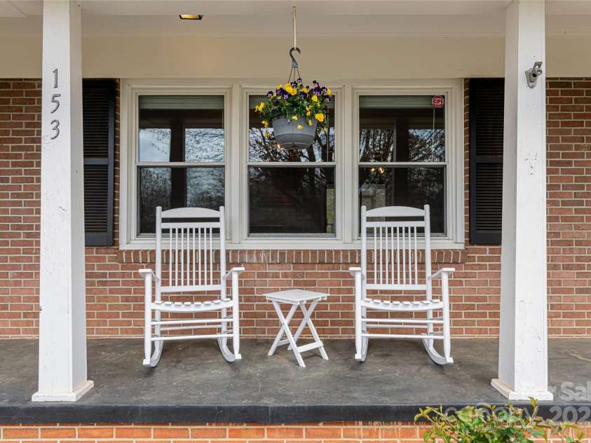 153 Brookwood Drive, Spindale, NC 28160.  MLS# CAR4241815, YatesRealty ID 4578. Rocking Chair Front Porch