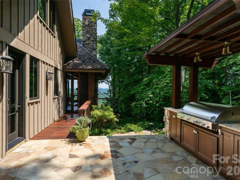 383 Eagle Ridge Road, Zirconia, NC 28790.  MLS# CAR4414334, YatesRealty ID 45781. Built-in grilling station just off kitchen