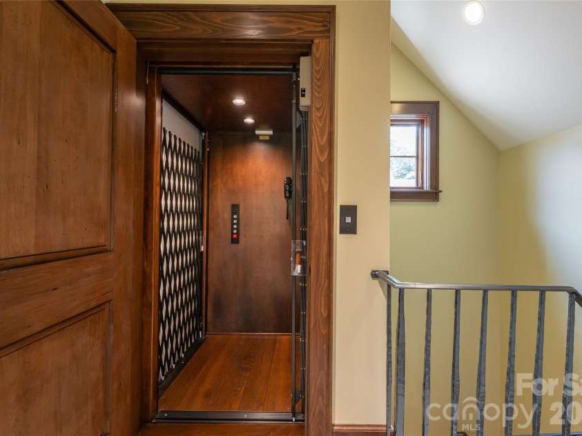 383 Eagle Ridge Road, Zirconia, NC 28790.  MLS# CAR4414334, YatesRealty ID 45781. Elevator in place