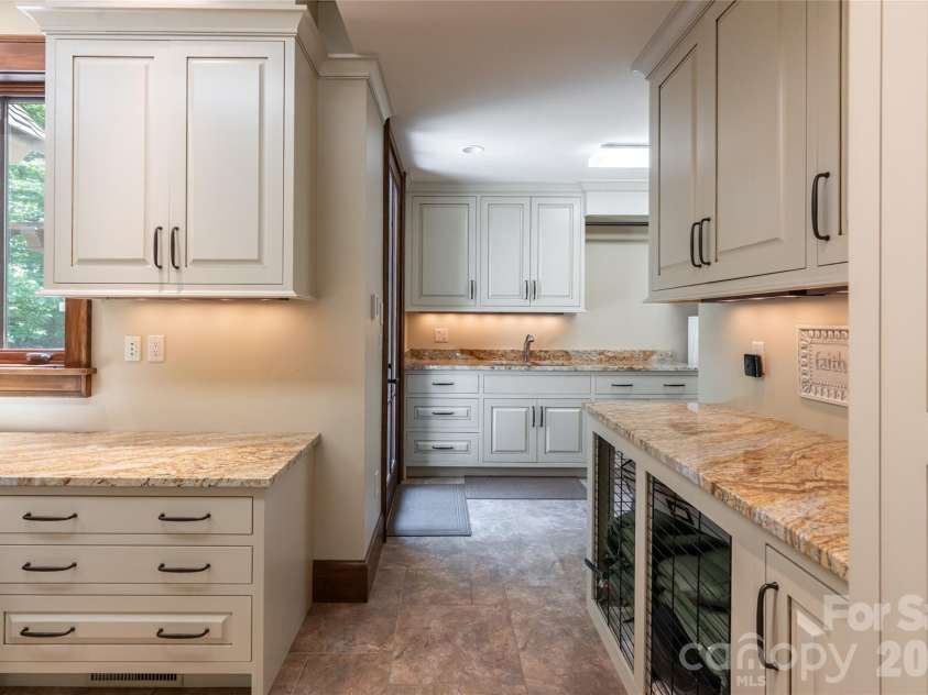 383 Eagle Ridge Road, Zirconia, NC 28790.  MLS# CAR4414334, YatesRealty ID 45781. Main Level Laundry Room