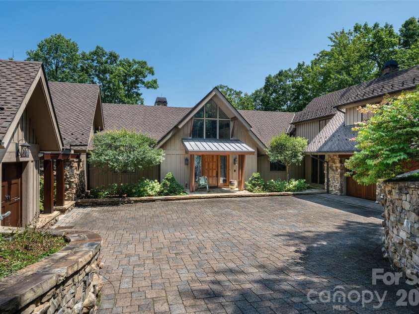 383 Eagle Ridge Road, Zirconia, NC 28790.  MLS# CAR4414334, YatesRealty ID 45781. Redefining the Mountain Modern aesthetic