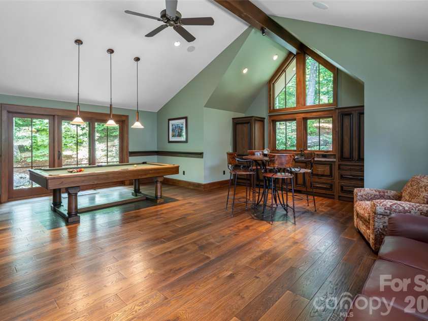 383 Eagle Ridge Road, Zirconia, NC 28790.  MLS# CAR4414334, YatesRealty ID 45781. Upper Level Recreation Room
