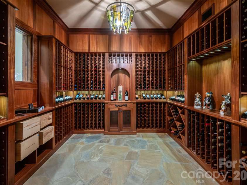 383 Eagle Ridge Road, Zirconia, NC 28790.  MLS# CAR4414334, YatesRealty ID 45781. Walk-in, climate controlled wine cellar