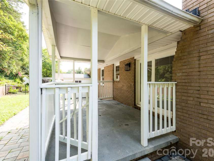 171 Suburban Avenue, Concord, NC 28025.  MLS# CAR4405894, YatesRealty ID 45797. Covered patio with railing
