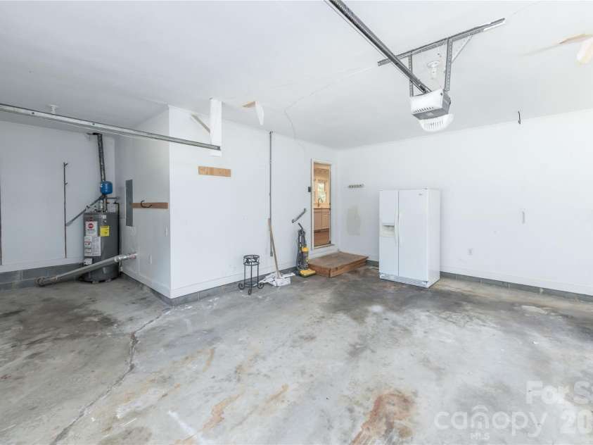 171 Suburban Avenue, Concord, NC 28025.  MLS# CAR4405894, YatesRealty ID 45797. Side area perfect for storage or work area