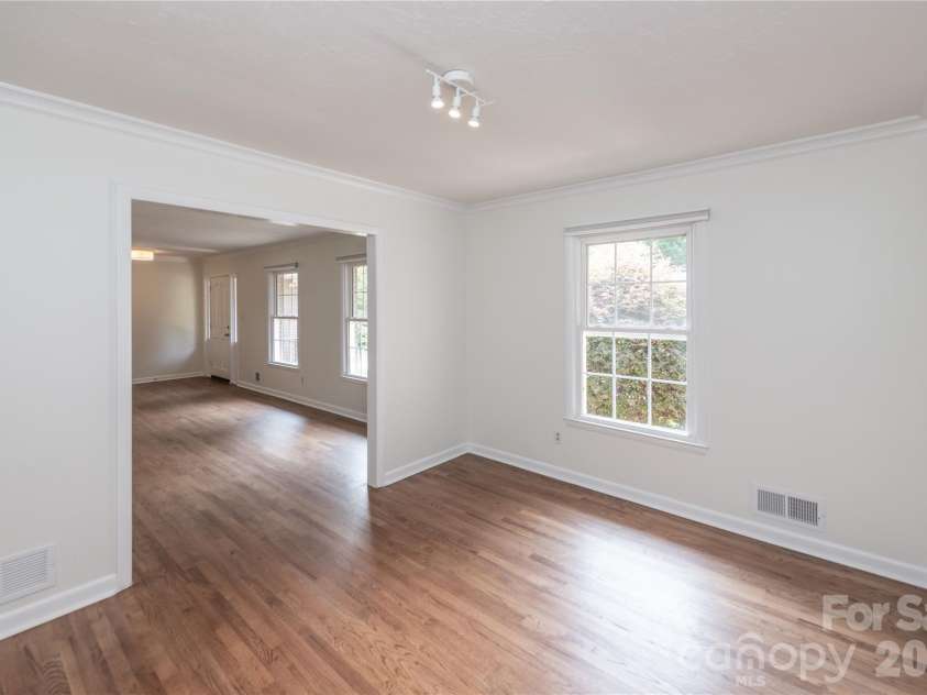 171 Suburban Avenue, Concord, NC 28025.  MLS# CAR4405894, YatesRealty ID 45797. View from dining room into the den