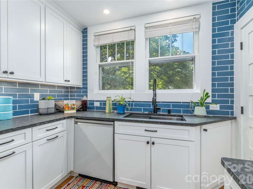 6 Birch Street, Asheville, NC 28801.  MLS# CAR4413466, YatesRealty ID 45798. Designer touches Subway Tile Backsplash