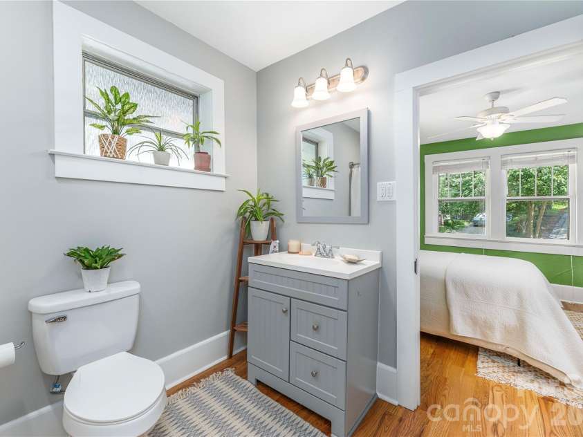 6 Birch Street, Asheville, NC 28801.  MLS# CAR4413466, YatesRealty ID 45798. Main level jack and jill bath