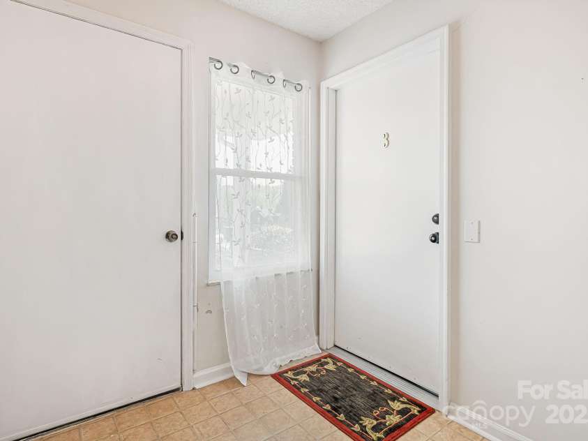 28 Capri Lane, Hendersonville, NC 28792.  MLS# CAR4247195, YatesRealty ID 458. 