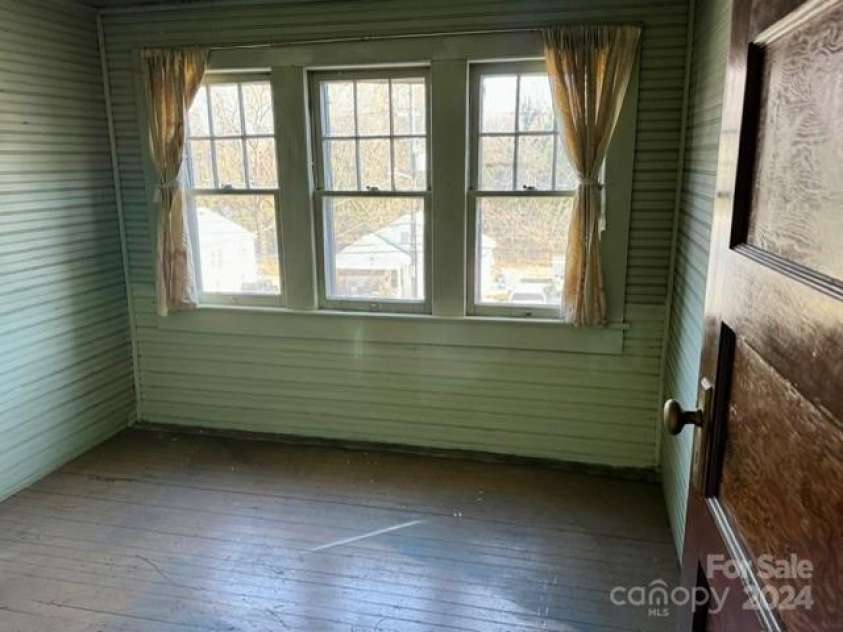 605 Meeting Street, Morganton, NC 28655.  MLS# CAR4085302, YatesRealty ID 458. Bedroom upstairs