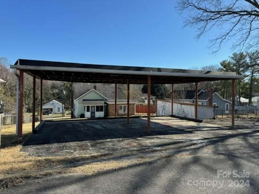 605 Meeting Street, Morganton, NC 28655.  MLS# CAR4085302, YatesRealty ID 458. Carport