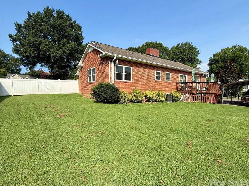 401 Mulberry Street, Cherryville, NC 28021.  MLS# CAR4416640, YatesRealty ID 45800. Back view- mostly fenced