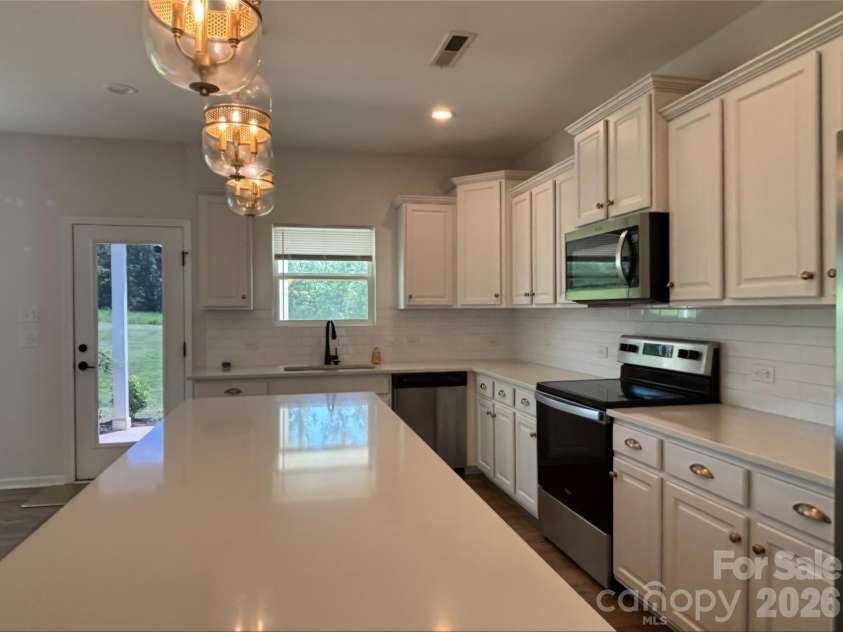 223 Old Harbor Drive, Mount Gilead, NC 27306.  MLS# CAR4416375, YatesRealty ID 45801. 