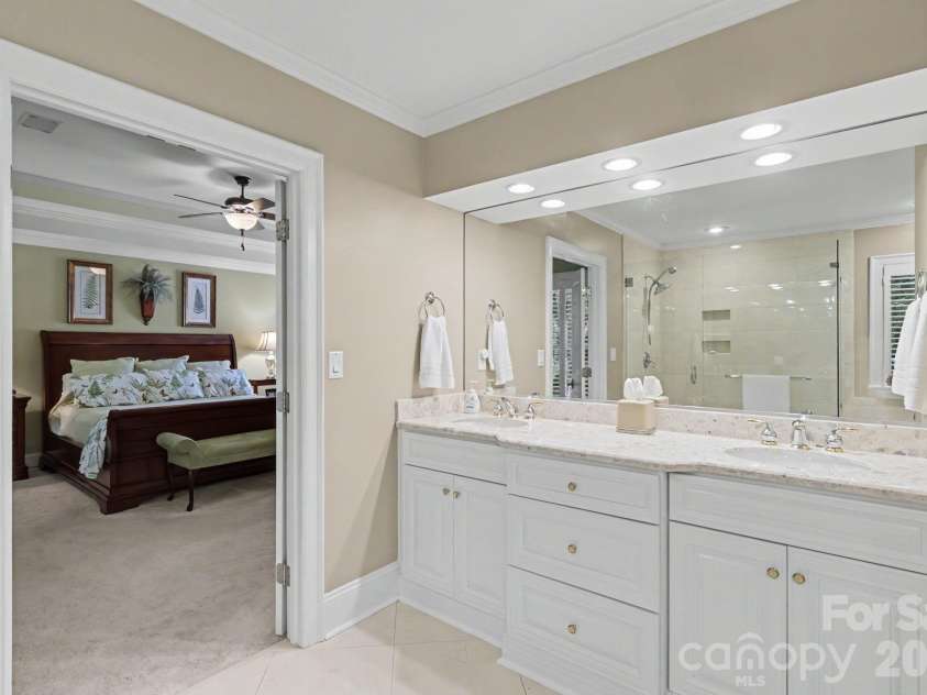 8724 Suninghurst Lane, Charlotte, NC 28277.  MLS# CAR4415077, YatesRealty ID 45802. Double door entry to bath