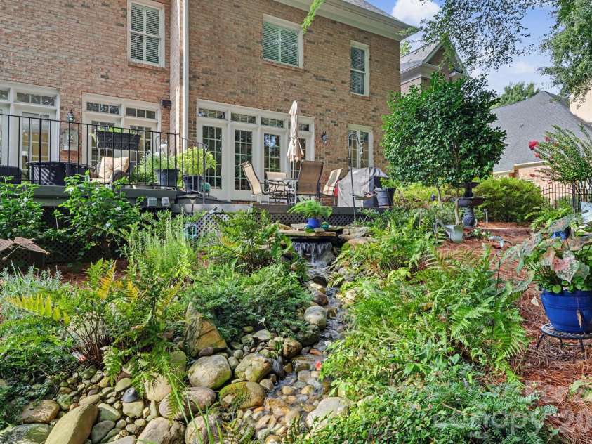 8724 Suninghurst Lane, Charlotte, NC 28277.  MLS# CAR4415077, YatesRealty ID 45802. Rock waterfall- picture doesn't do it justice.