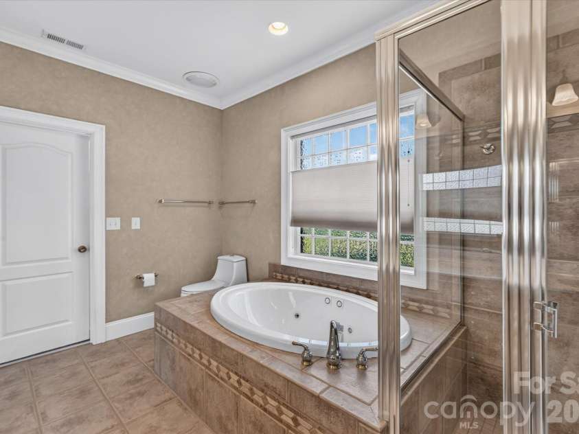 1913 Windmere Drive, Monroe, NC 28110.  MLS# CAR4416282, YatesRealty ID 45805. Primary Bath