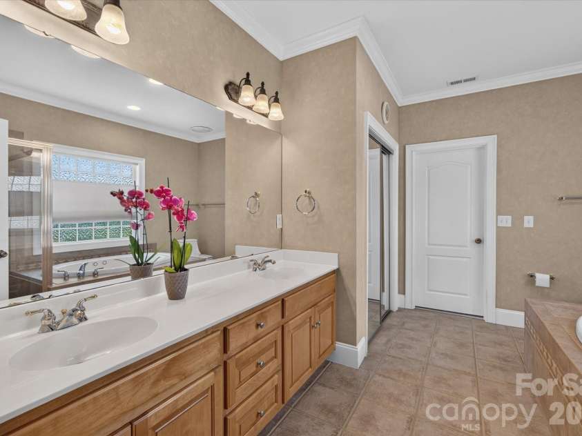 1913 Windmere Drive, Monroe, NC 28110.  MLS# CAR4416282, YatesRealty ID 45805. Primary Bath