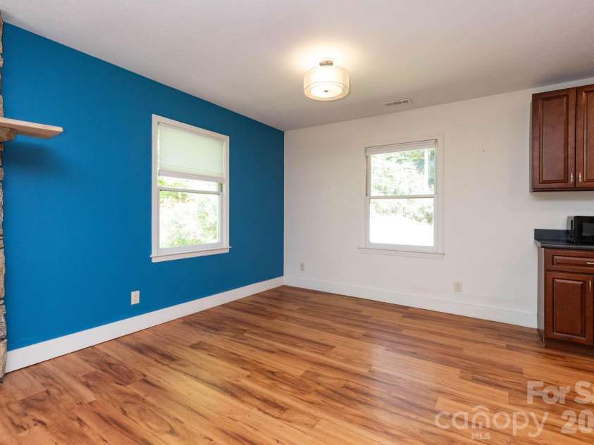 1009 Sharon Ridge Road, Fairview, NC 28730.  MLS# CAR4416738, YatesRealty ID 45809. Dining/living area.