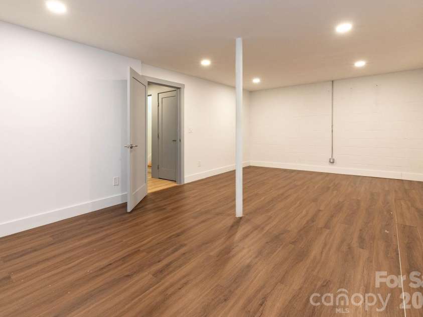 1009 Sharon Ridge Road, Fairview, NC 28730.  MLS# CAR4416738, YatesRealty ID 45809. Finished basement area.