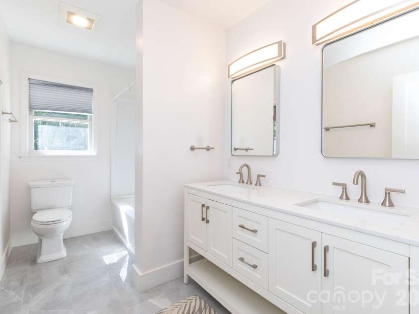1009 Sharon Ridge Road, Fairview, NC 28730.  MLS# CAR4416738, YatesRealty ID 45809. Main level bath.