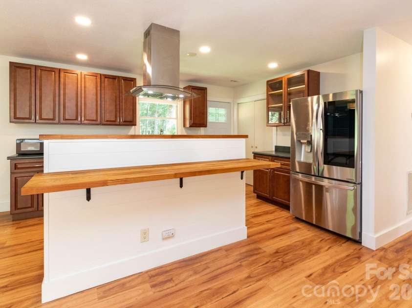 1009 Sharon Ridge Road, Fairview, NC 28730.  MLS# CAR4416738, YatesRealty ID 45809. Open kitchen floor plan.