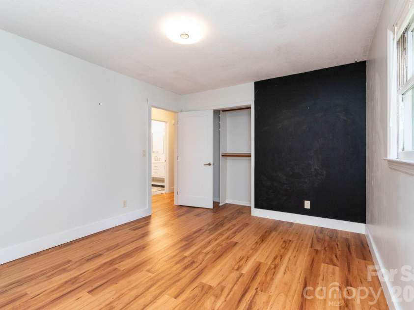 1009 Sharon Ridge Road, Fairview, NC 28730.  MLS# CAR4416738, YatesRealty ID 45809. Second main level bedroom.