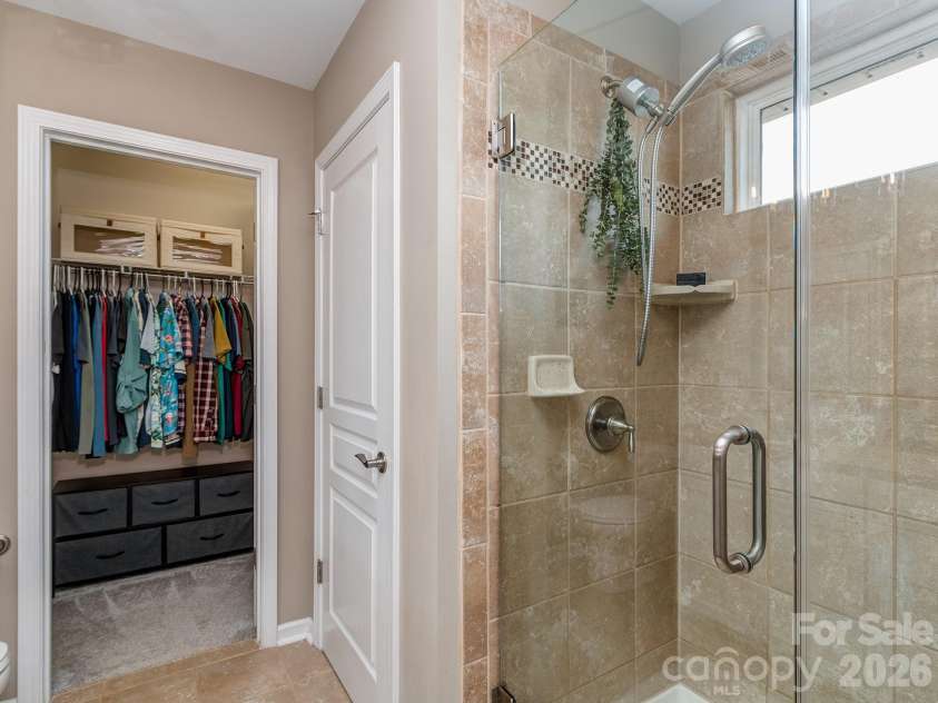 4128 Park South Station Boulevard, Charlotte, NC 28210.  MLS# CAR4416323, YatesRealty ID 45813. Primary Bath with Frameless shower