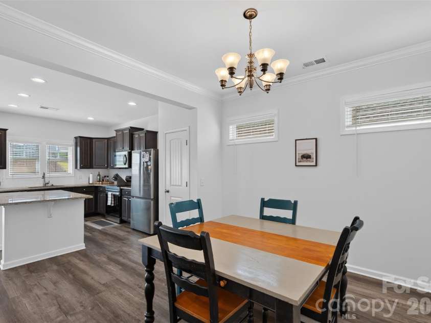 132 Calming Creek Way, Elgin, SC 29045.  MLS# CAR4416255, YatesRealty ID 45815. Dining Area looking into Kitchen