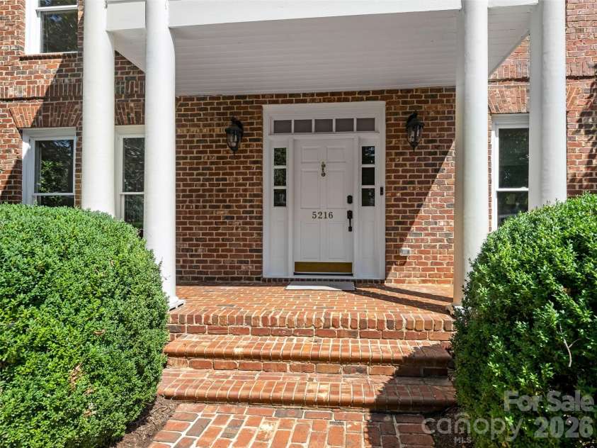 5216 Sunningdale Drive, Charlotte, NC 28277.  MLS# CAR4416178, YatesRealty ID 45821. Brick front porch
