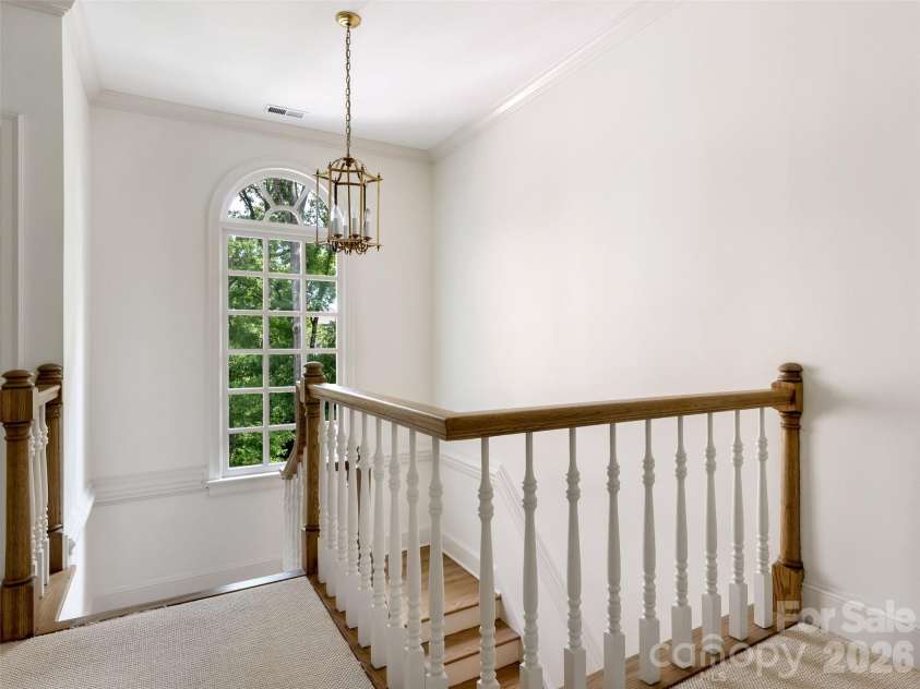 5216 Sunningdale Drive, Charlotte, NC 28277.  MLS# CAR4416178, YatesRealty ID 45821. Gorgeous window and second floor landing